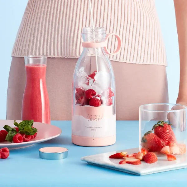 COMPACT ELECTRIC FRUIT JUICER